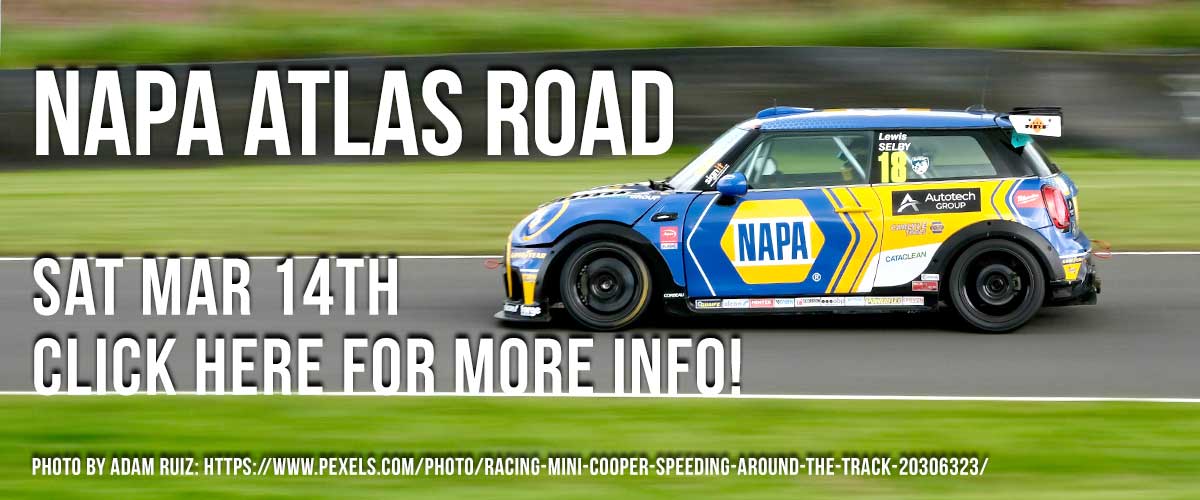 Background image of a Napa sponsored mini copper speeding down the road with a green blurred background with an overlay white type saying on the first line, Tour of Napa and on the second line, Sat Mar 14th and on the third line, Click here for more info! and on the fourth line, Photo by Adam Ruiz: https://www.pexels.com/photo/racing-mini-cooper-speeding-around-the-track-20306323/